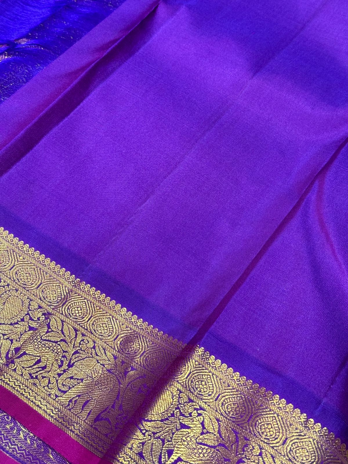 Pista green with violetish purple border with buttas korvai