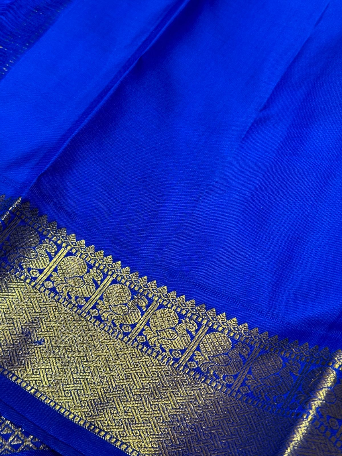 Deep Emerald green with royal blue Korvai