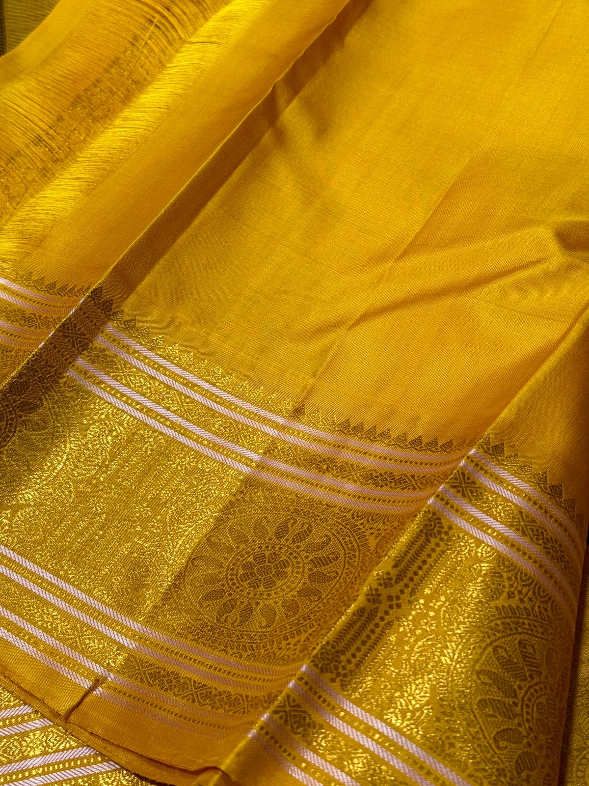 Brownish Maroon with golden yellow buttas korvai