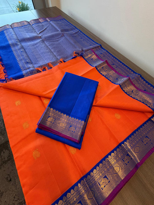 Bright Orange violetish blue mayil chakram buttas korvai