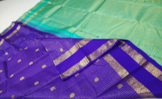 Deep violet zari checks / buttas rettapate Teal korvai pallu
