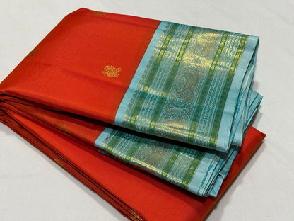 Orange with powder blue Minakari work