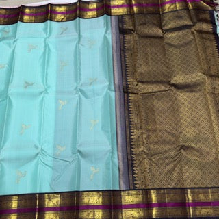 Aqua blue with blackish purple
