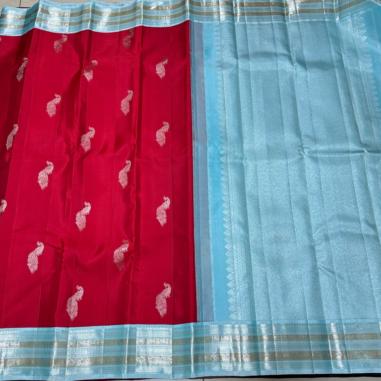 Red with powder blue buttas korvai