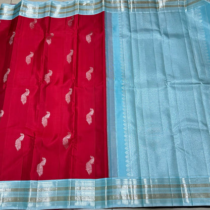 Red with powder blue buttas korvai