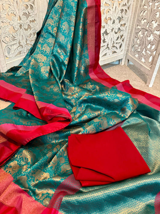 Teal / pink Jacquard Benarasi elephant motiffs wovenbrocade