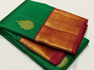 Emerald green with red