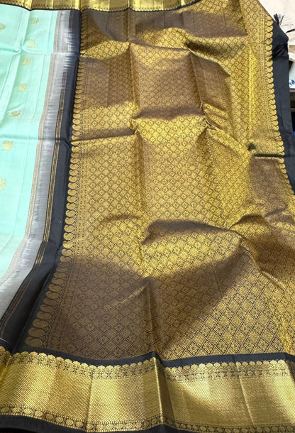 Teal black mayil chakram buttas korvai