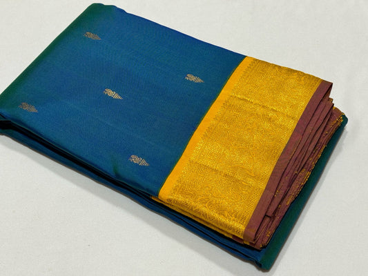 Peacock blue with golden mustard buttas korvai
