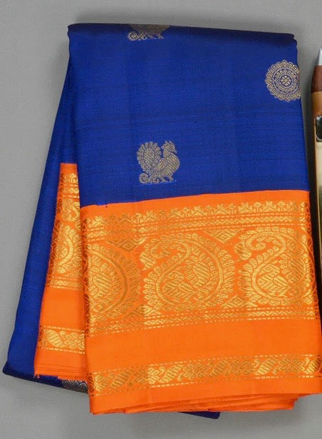 Royal blue / orange mayil chakram buttas korvai