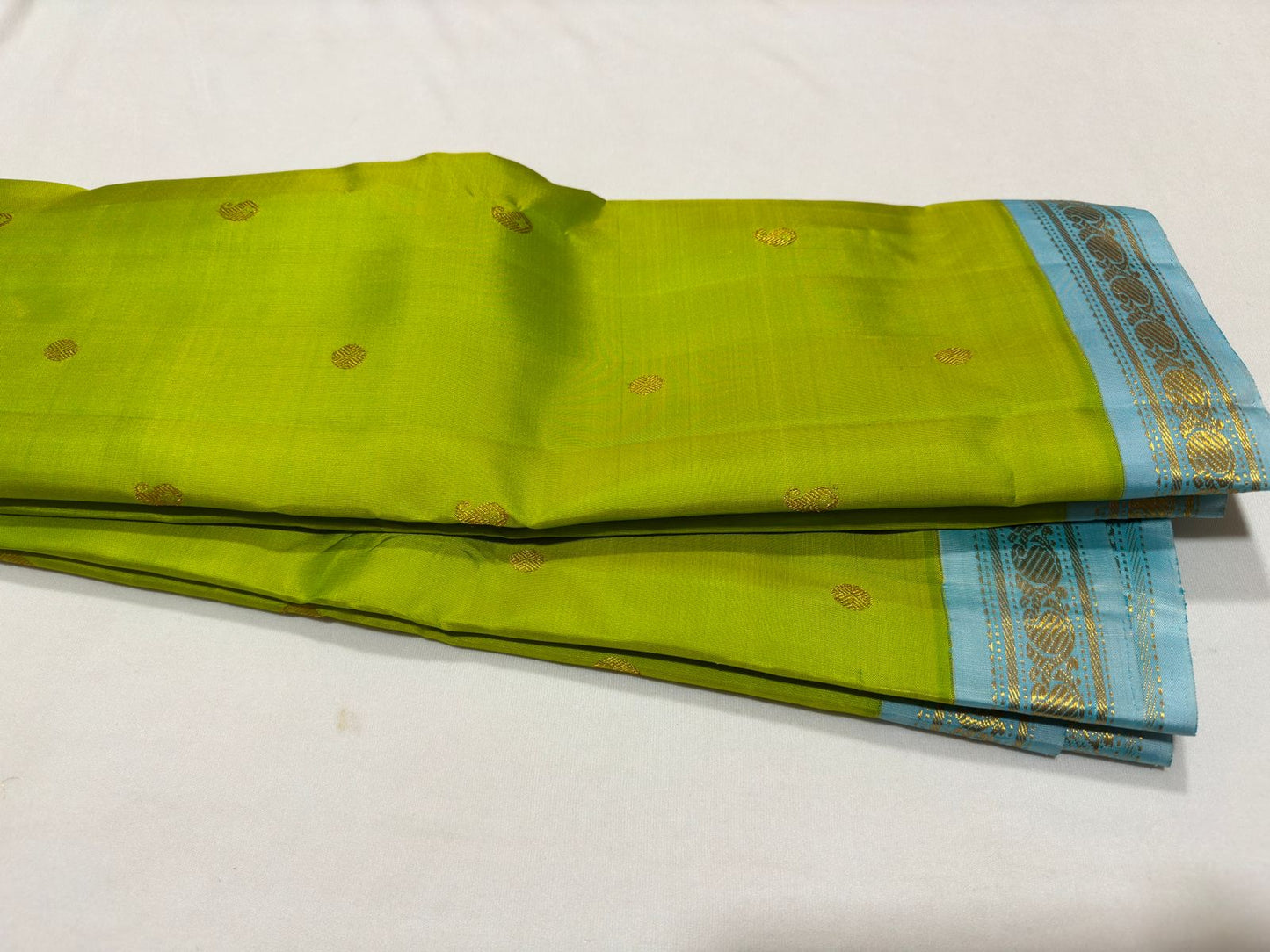 Pastel green with blue buttas korvai
