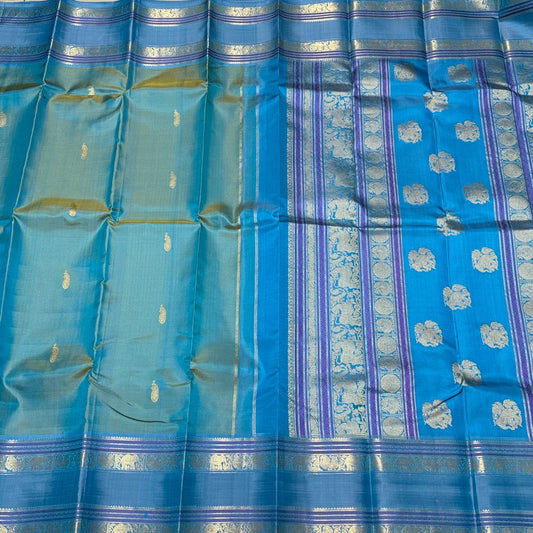 Pastel blue green/light blue elephant thodar motiffs