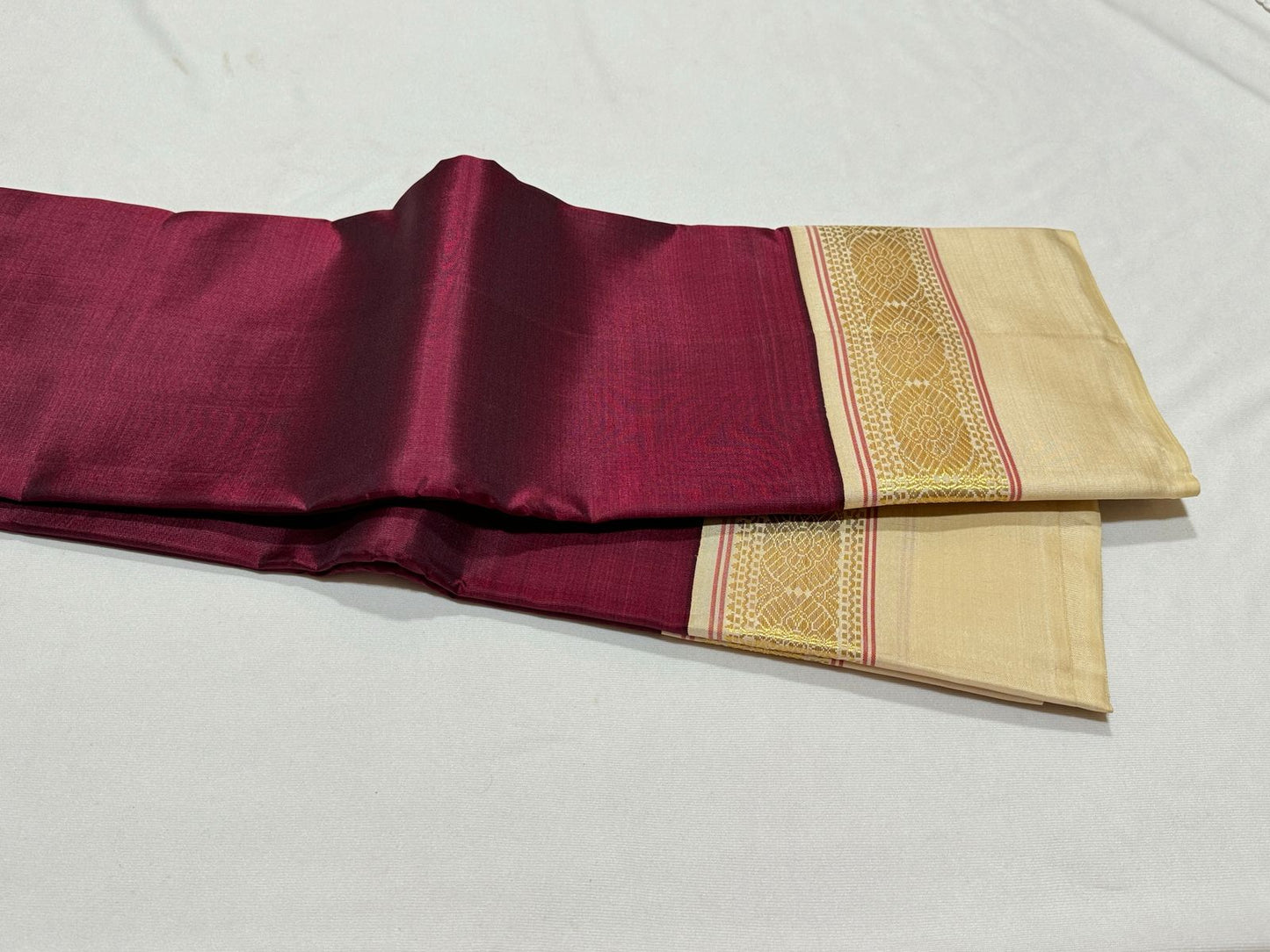 Deep maroon with creamish white korvai