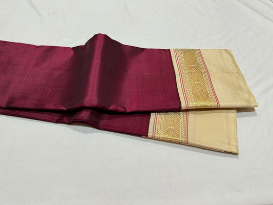 Deep maroon with creamish white korvai
