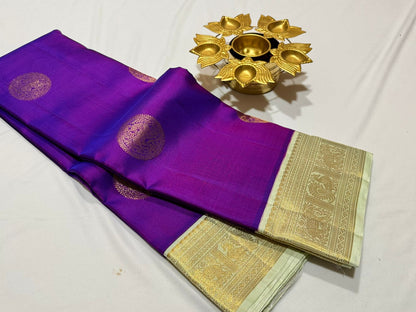 Purple / pista green buttas korvai