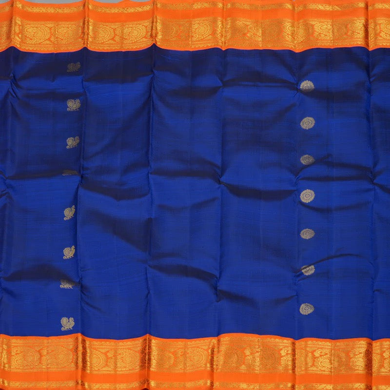 Royal blue / orange mayil chakram buttas korvai