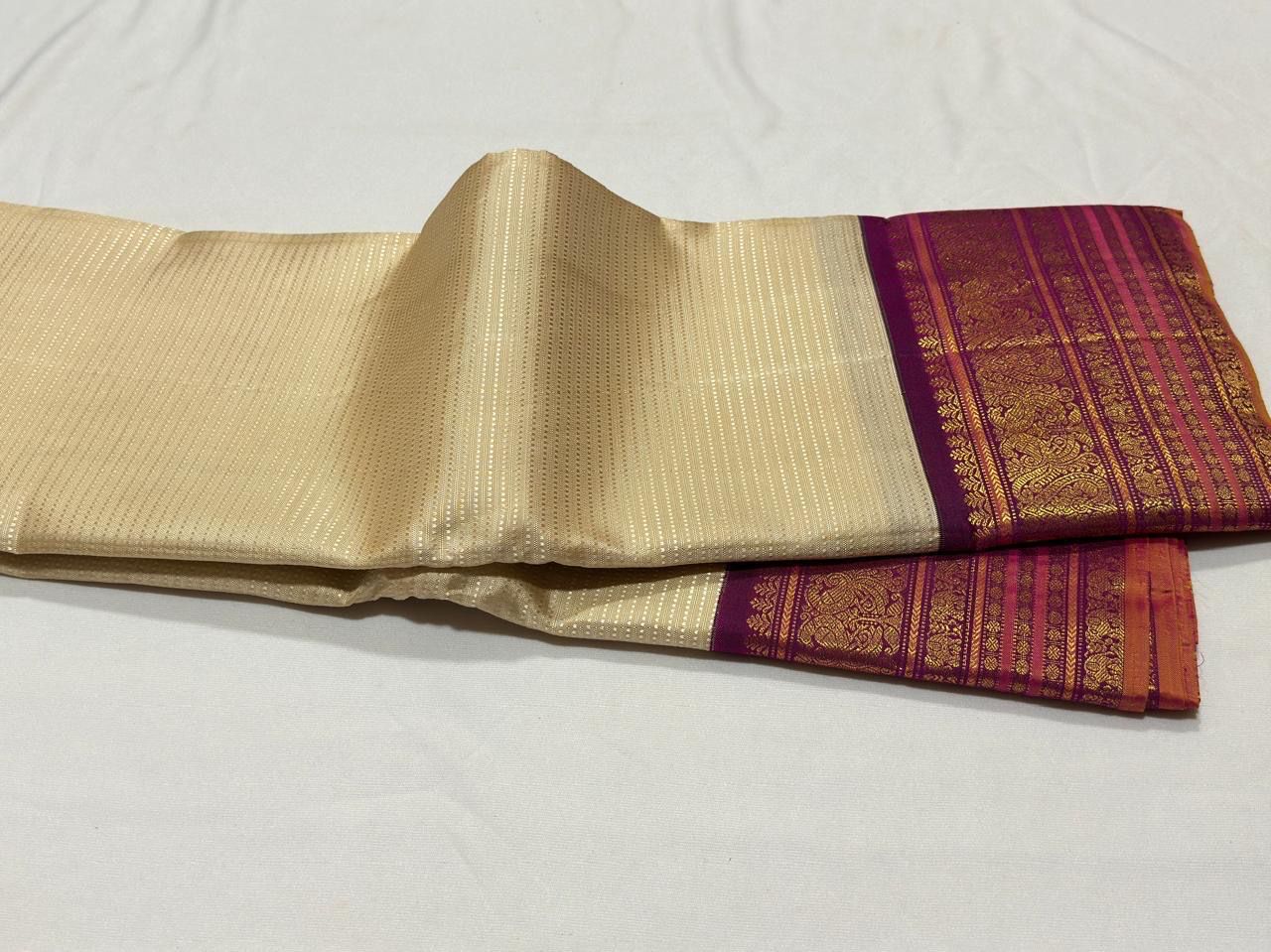 Ivory with deep purple silk thread woven Korvai