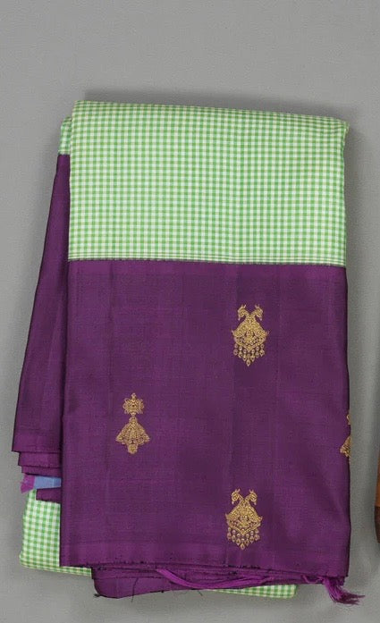 Pista green muted checks with plum purple border korvai