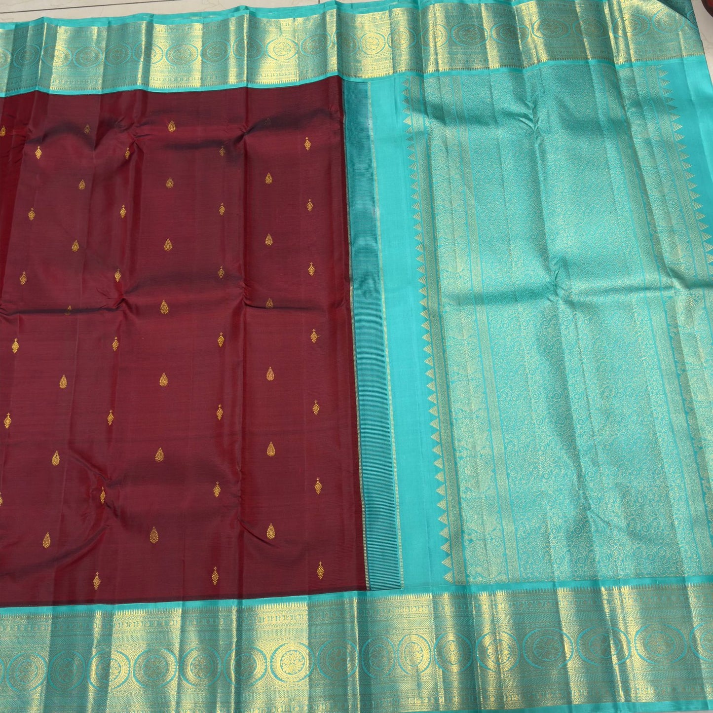 Maroon with acqua blue buttas korvai