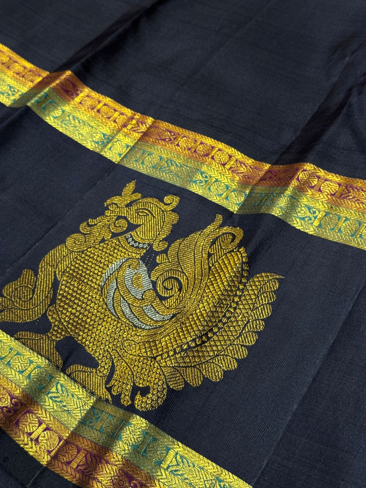 Peach with navy blue Meenakari borders