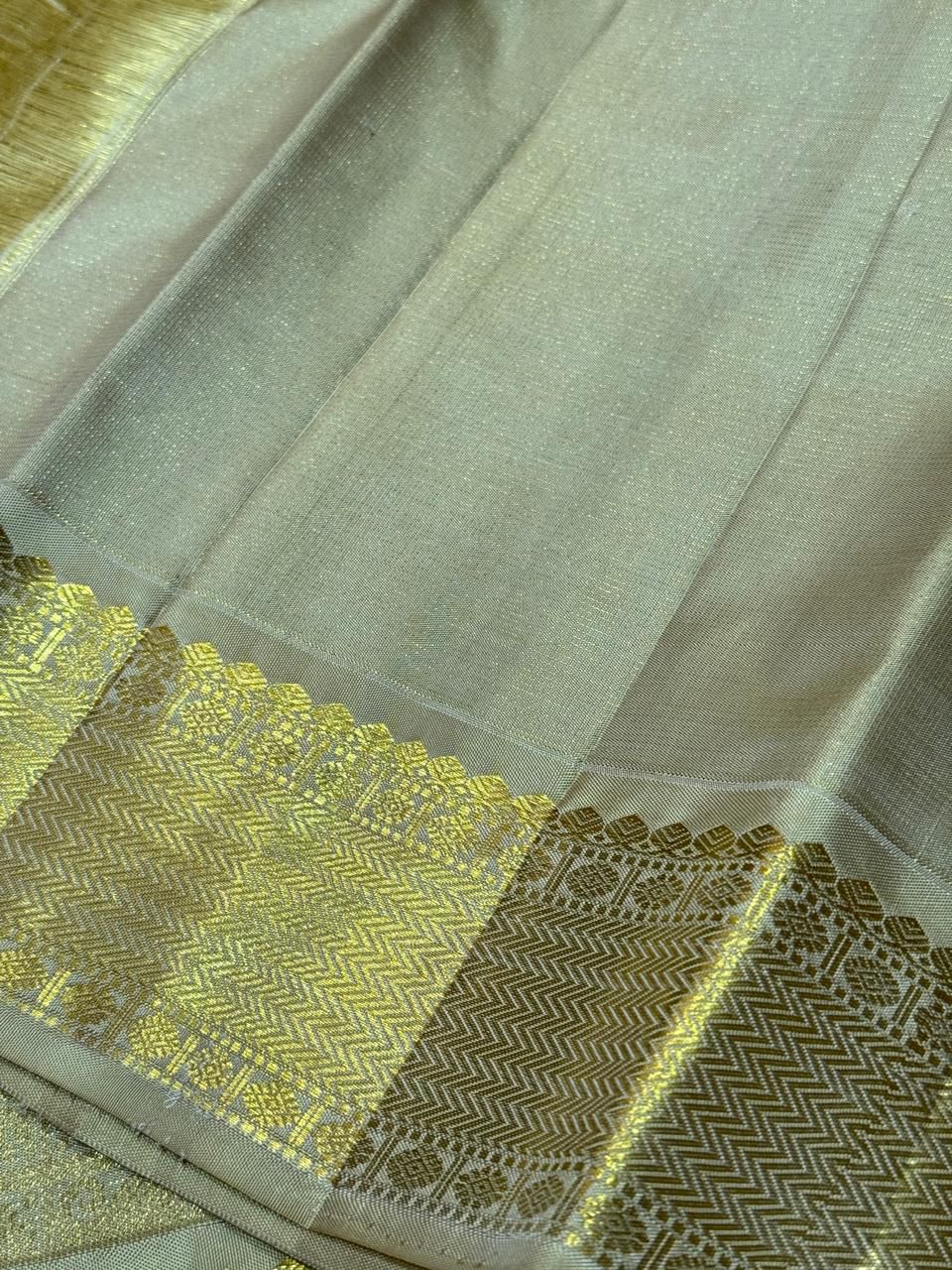 Olive green pinkish beige vairaoosi mayil chakram buttas korvai