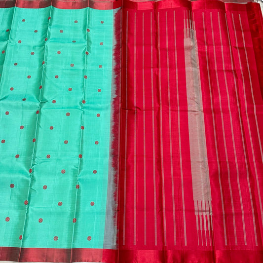 Turquoise green with red buttas
