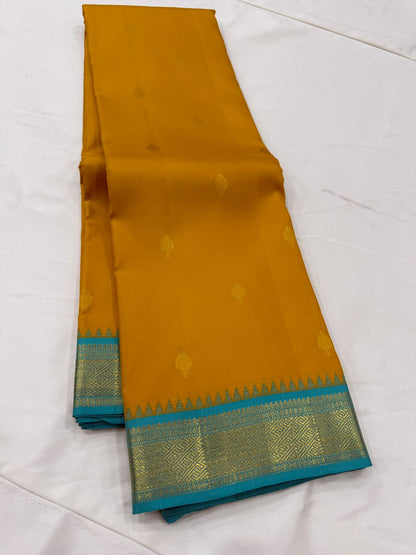 Dual tone mustard / teal buttas korvai