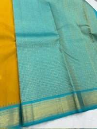 Dual tone mustard / teal buttas korvai