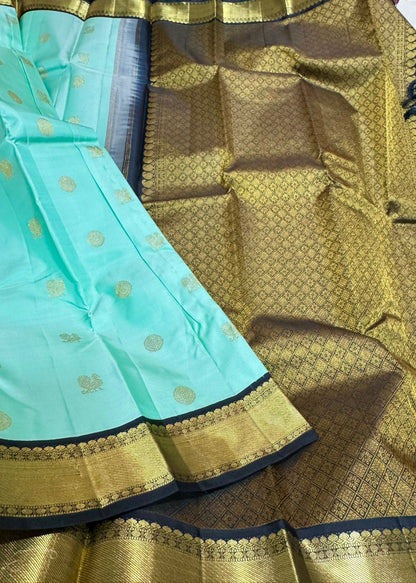 Teal black mayil chakram buttas korvai