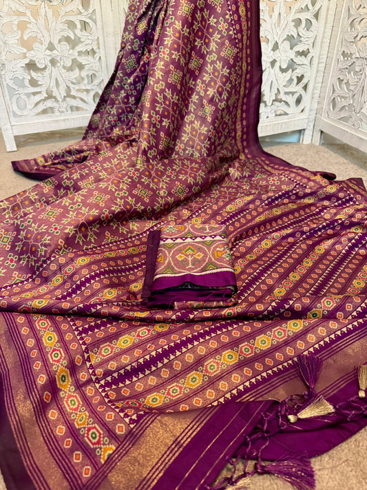 Pure tissue silk in Patola Burgundy woven all over