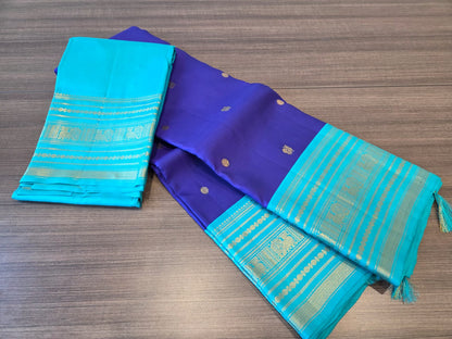 Violetish blue blue / Teal varisaipet border buttas korvai