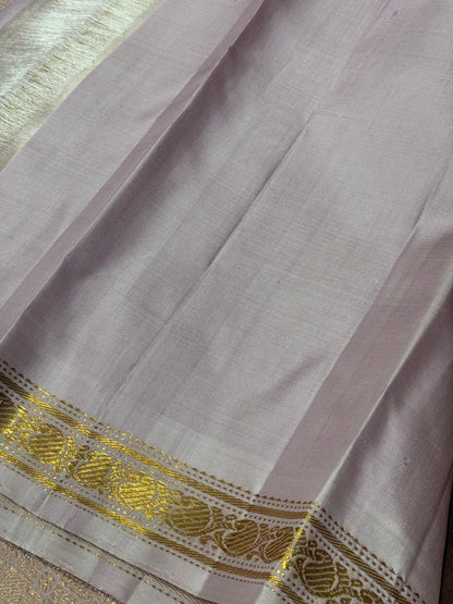 Dual tone brown with soft pastel creamish pink shade with buttas korvai
