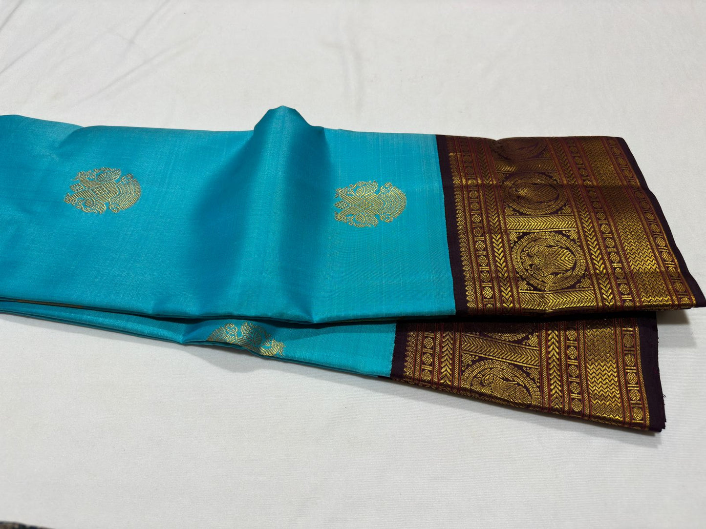 Ananda blue with purplish brown korvai Ganda Berunda buttas
