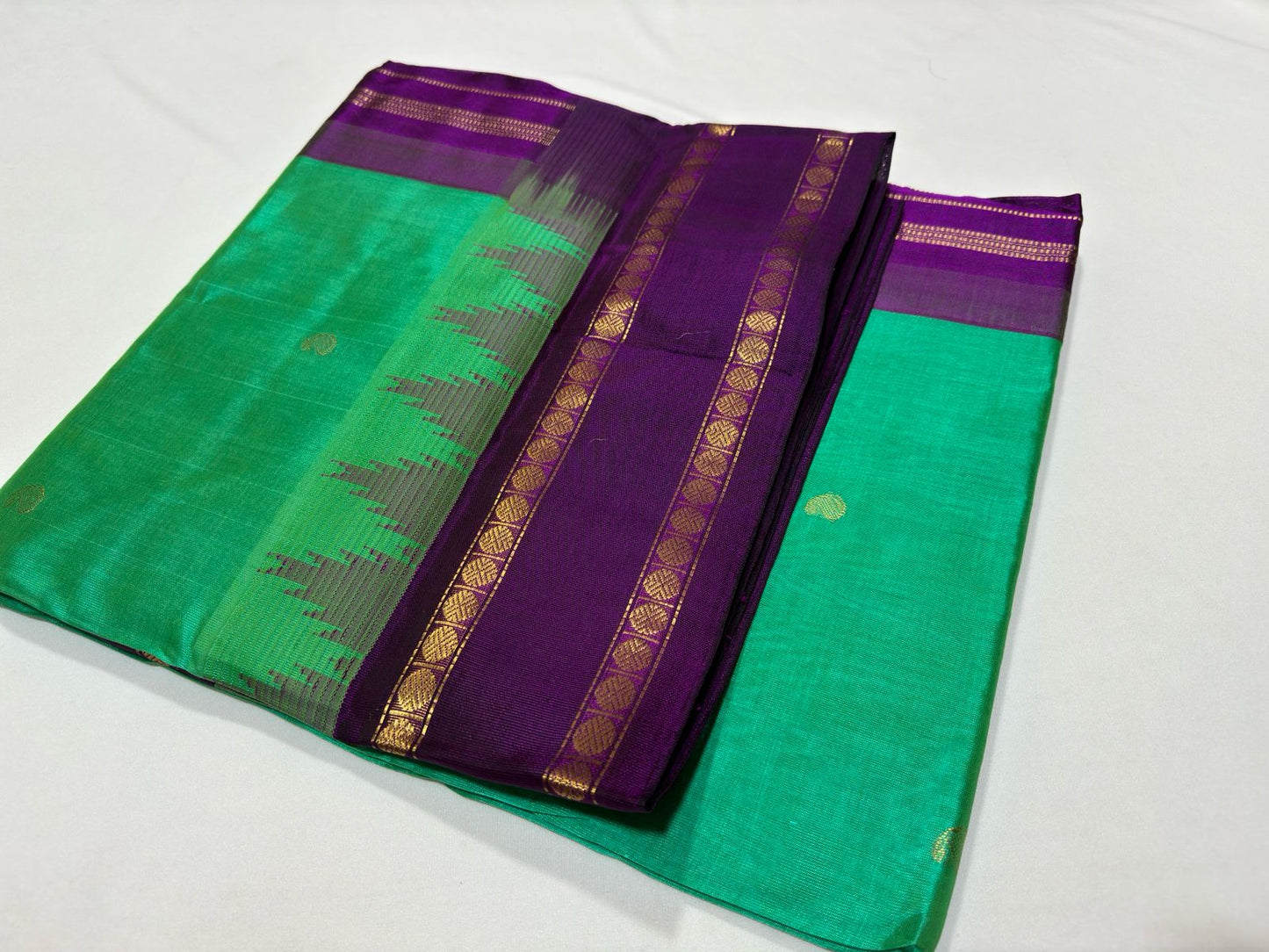 Korvai with buttas sea green with purple temple border