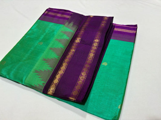 Korvai with buttas sea green with purple temple border