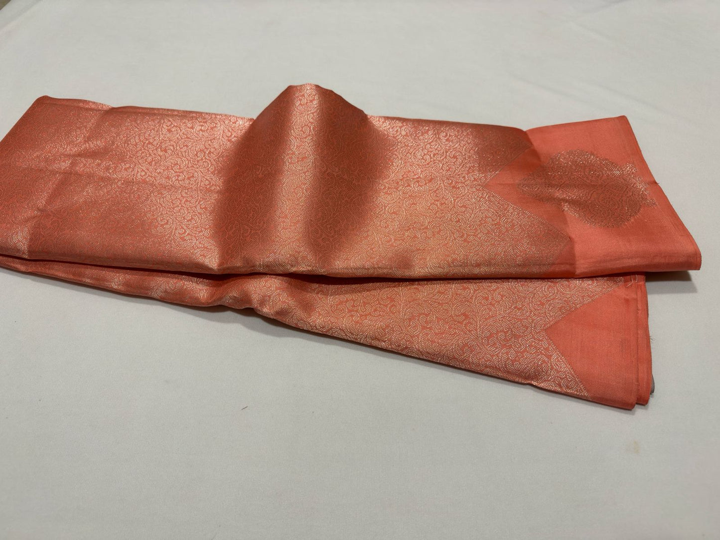 Peach with soft greyish brown jacquard