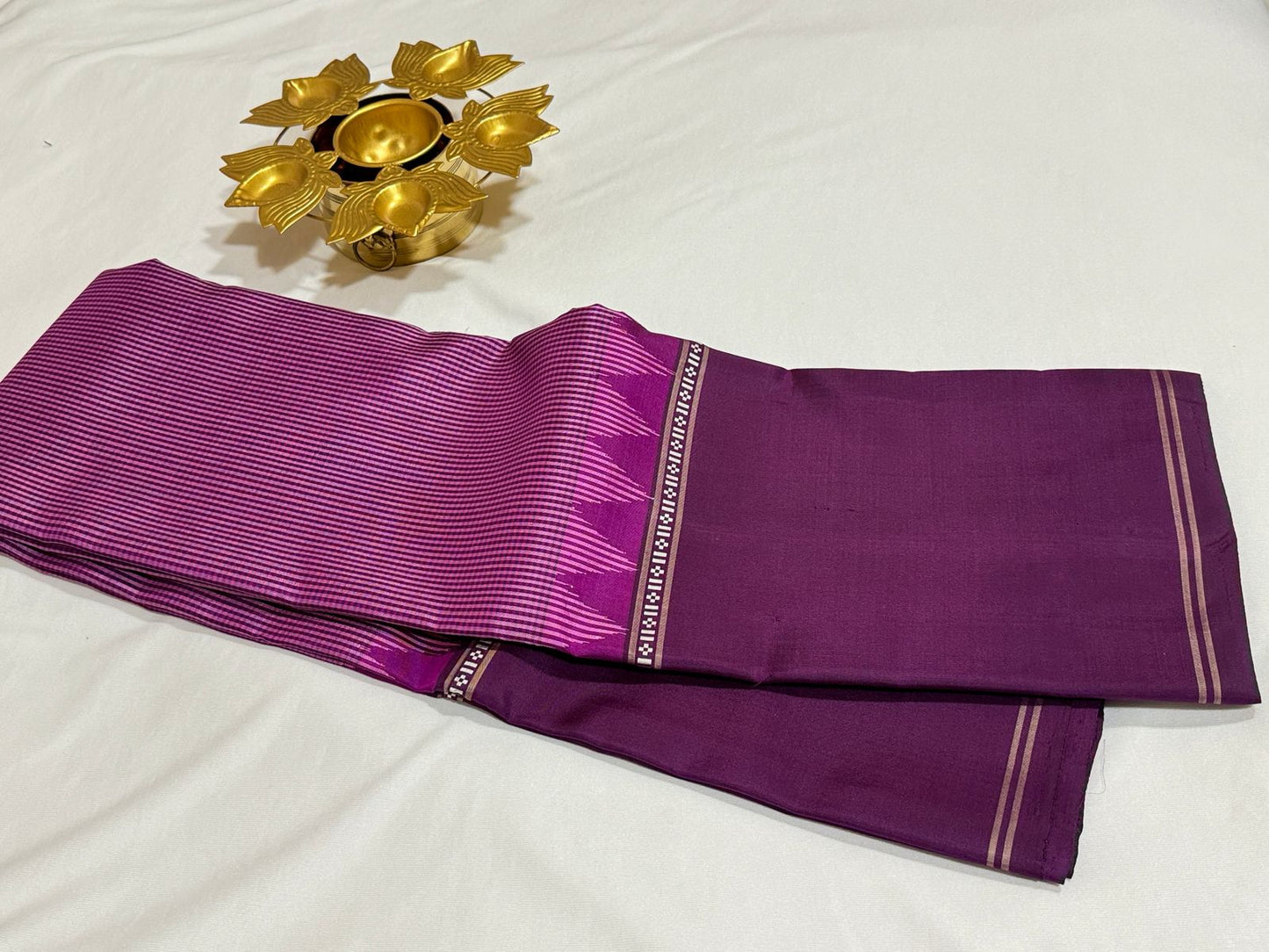 Light pink with purple muted checks temple border