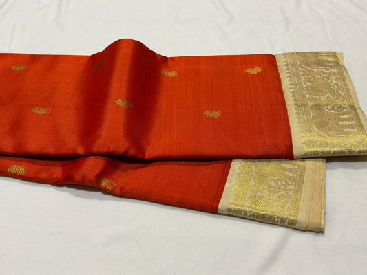 Burnt Orange with creamish white buttas Korvai