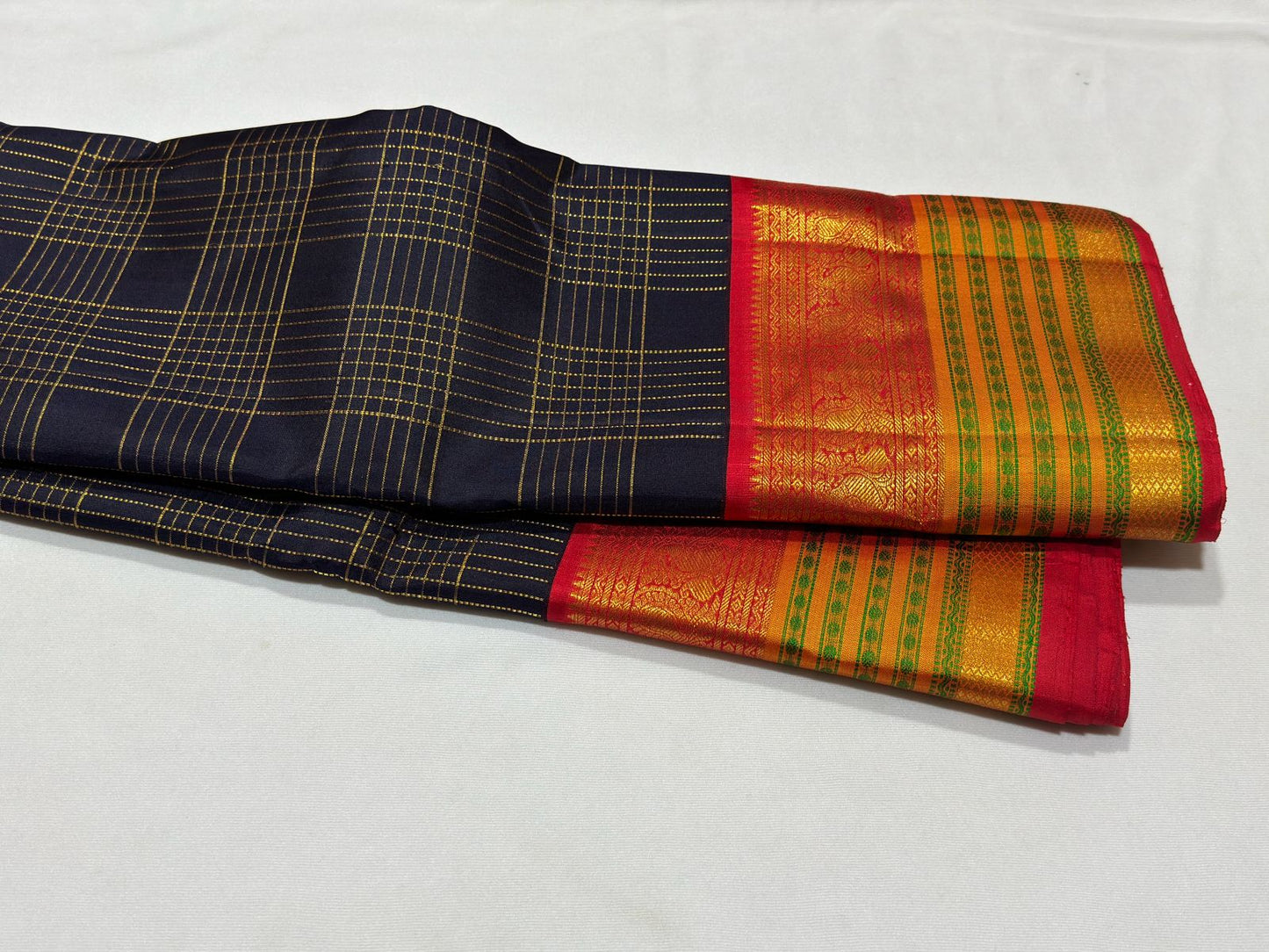 Deep navy blue red Zari checks Minakari woven borders