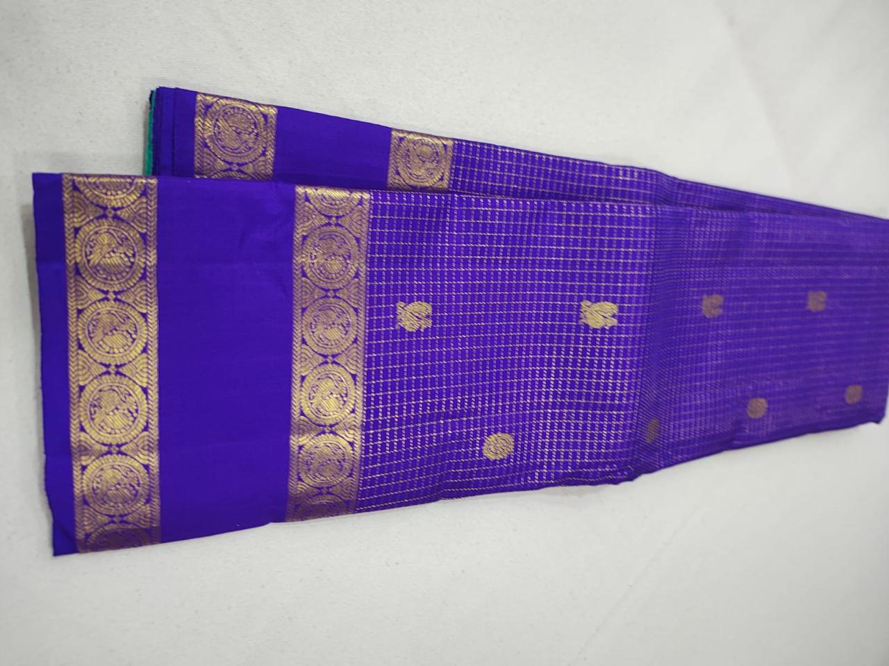 Deep violet zari checks / buttas rettapate Teal korvai pallu