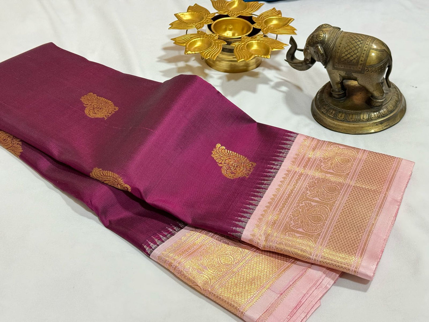 Deep kungumam maroonish wine buttas korvai