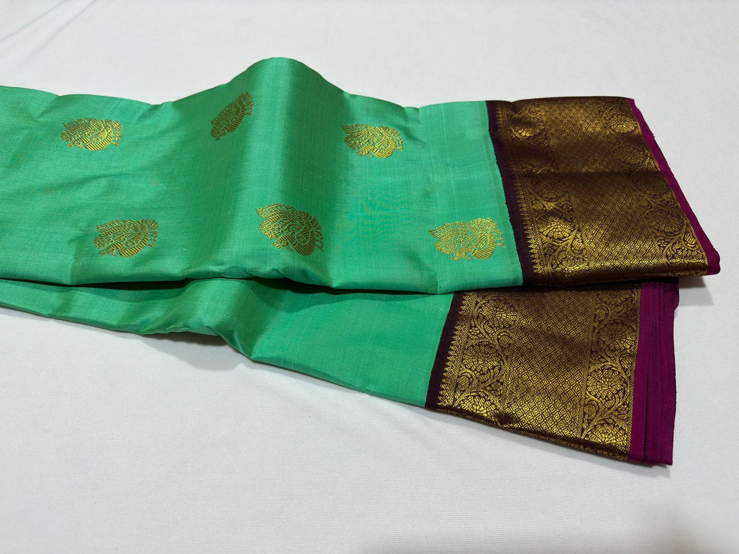 Bright green purple gandha berunda motif