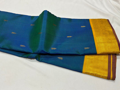 Peacock blue with golden mustard buttas korvai