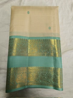 Cream / Beige dual tone pastel blue rettapate korvai thread buttas