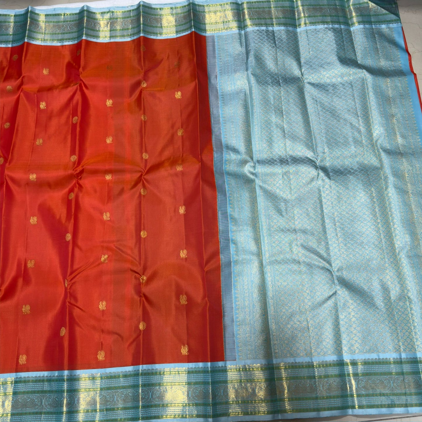 Orange with powder blue Minakari work