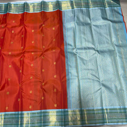 Orange with powder blue Minakari work