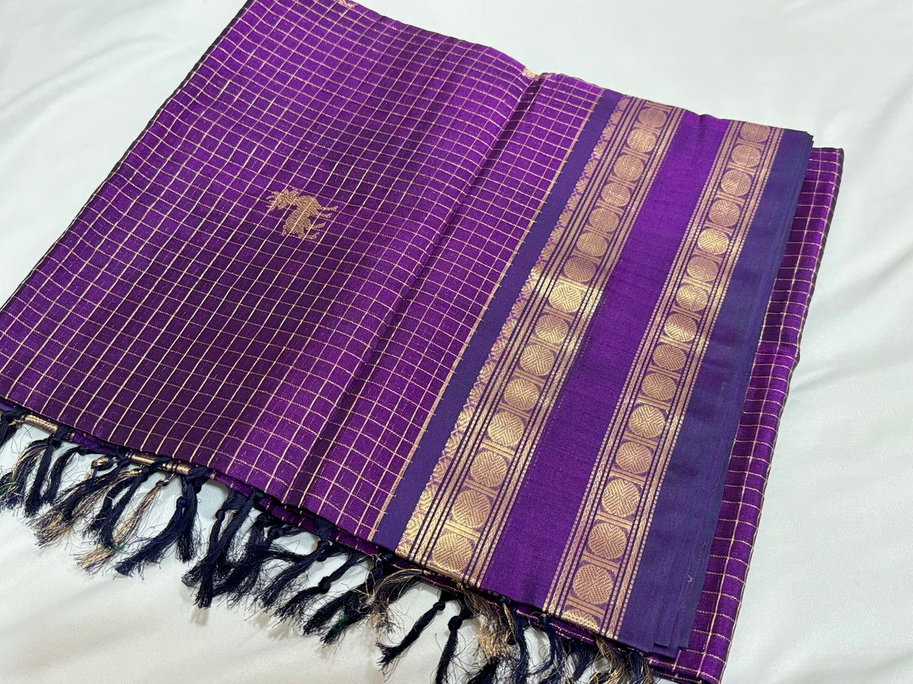 Dark purple with gold deer buttas in Zari checks