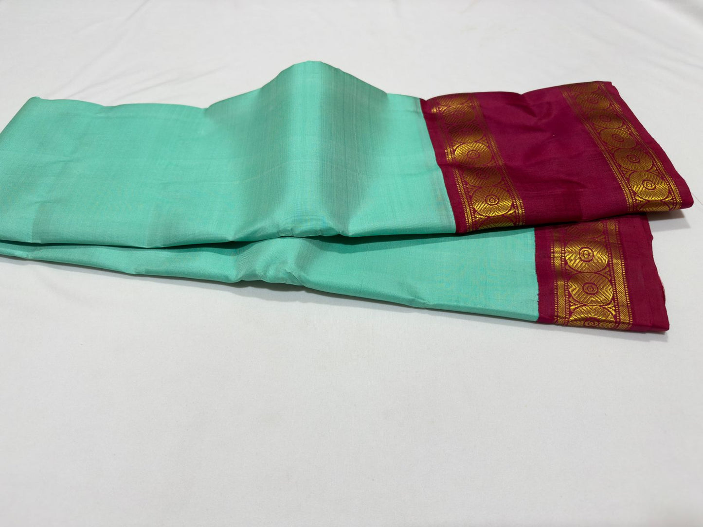 Teal green with arakku korvai