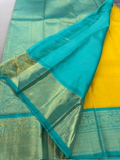 Mustard yellow / teal gold / silver buttas korvai