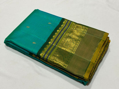 Peacock green with bottle green buttas korvai